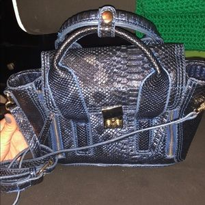 Blue snakeskin purse